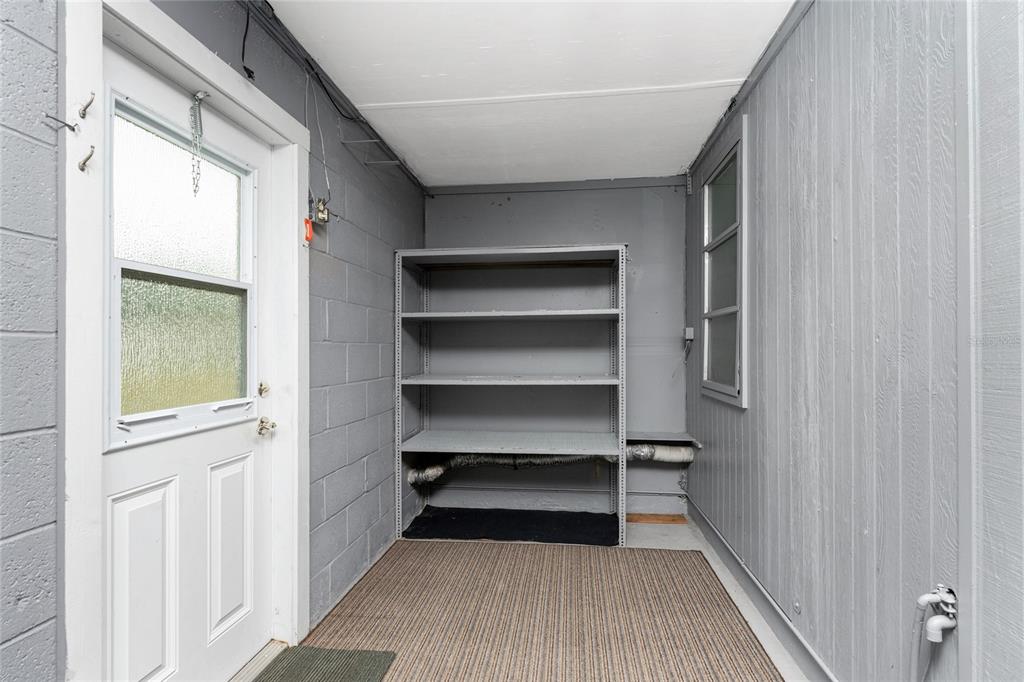 442 Kostner Street Port Charlotte, FL 33954 - Photo 43 of 69 a view of walk in closet with empty racks