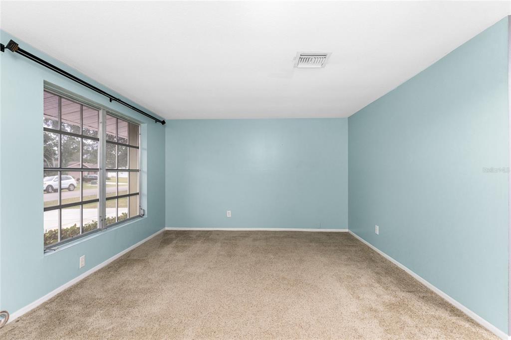 442 Kostner Street Port Charlotte, FL 33954 - Photo 8 of 69 an empty room with a window
