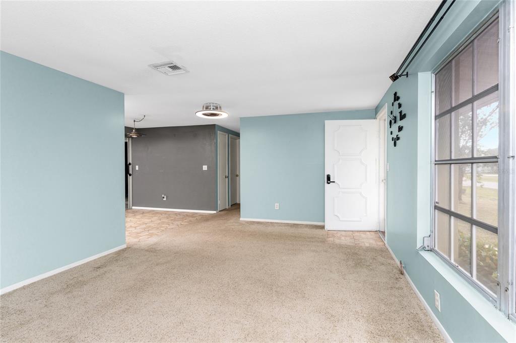 442 Kostner Street Port Charlotte, FL 33954 - Photo 10 of 69 a view of an empty room with a window