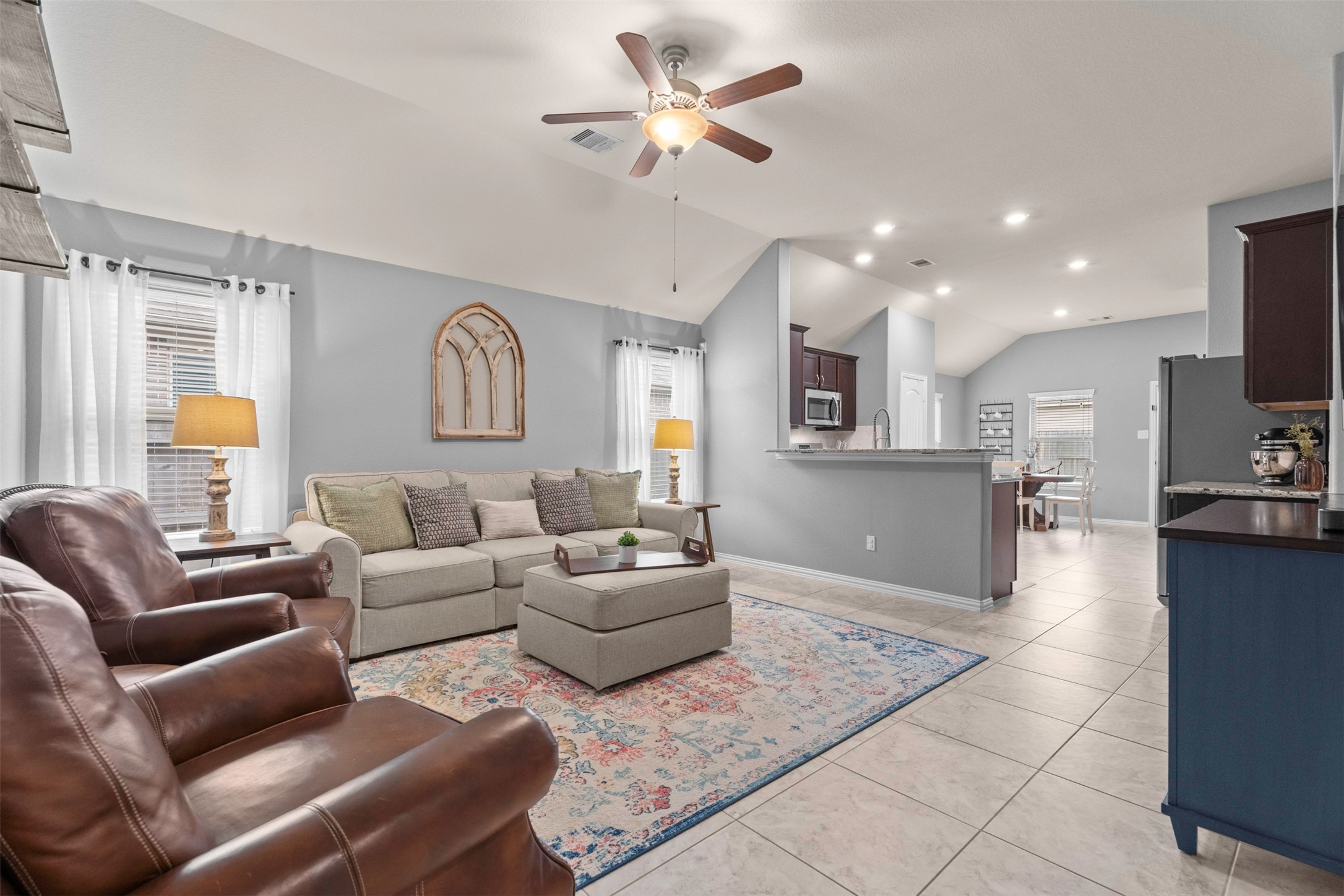4480 Lone Alcove Drive Spring, TX 77386 - Photo 5 of 45 The home is drenched in sunlight and has tall ceilings and pretty tile floors for easy maintenance. NO CARPET!