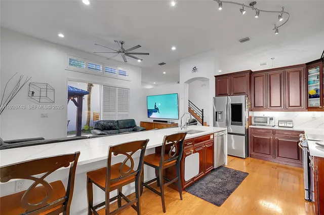 a bathroom with a sink vanity and a mirror