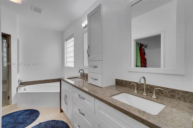 a view of swimming pool with a yard and lake view