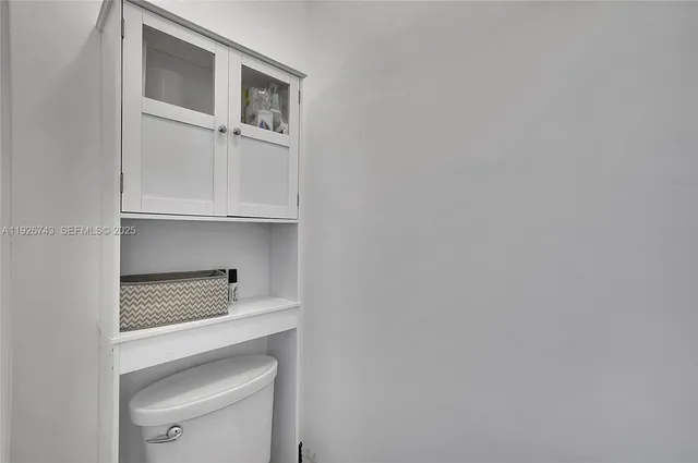 a swimming pool with outdoor seating and yard