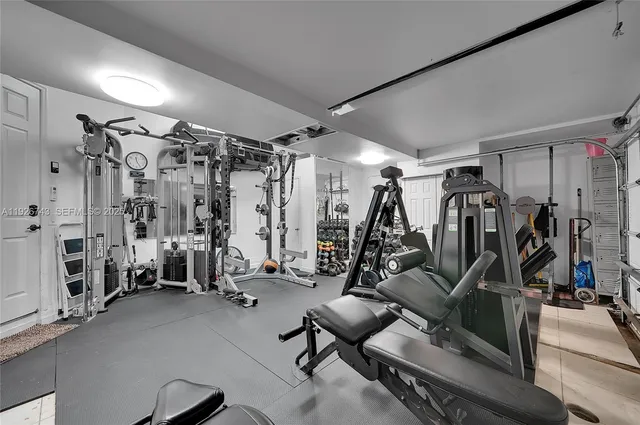 a view of kitchen with furniture and wooden floor