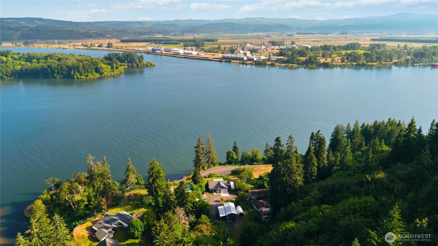 119 Old Mill Creek Road Longview, WA 98632 - Photo 38 of 40 a view of a lake with houses