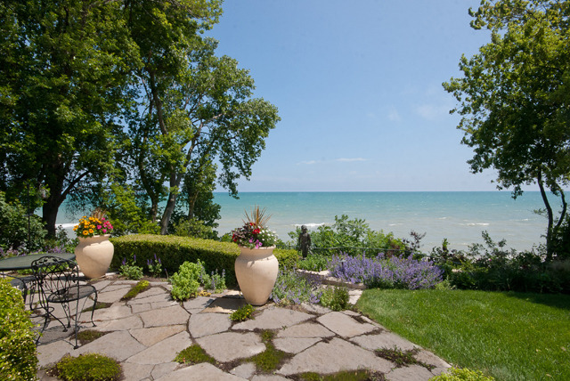 337 Sheridan Road Winnetka, IL 60093 - Photo 18 of 25 a view of a chair and table on the garden