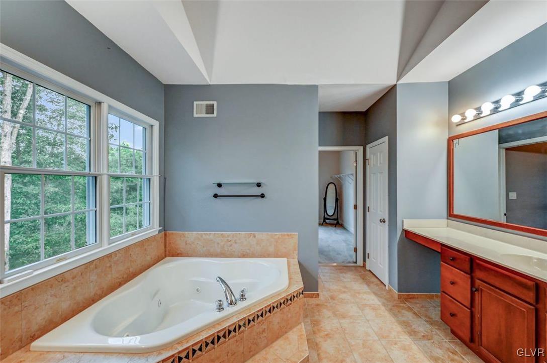 175 Jacoby Run Road Mount Bethel, PA 18343 - Photo 30 of 50 The Primary Suite includes a jetted corner tub wit