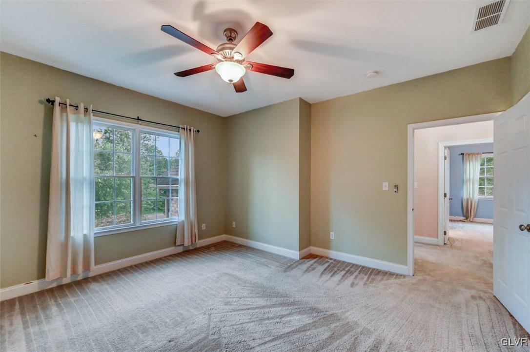 175 Jacoby Run Road Mount Bethel, PA 18343 - Photo 36 of 50 Bedroom 3 has dbl yard-facing windows, a lighted f