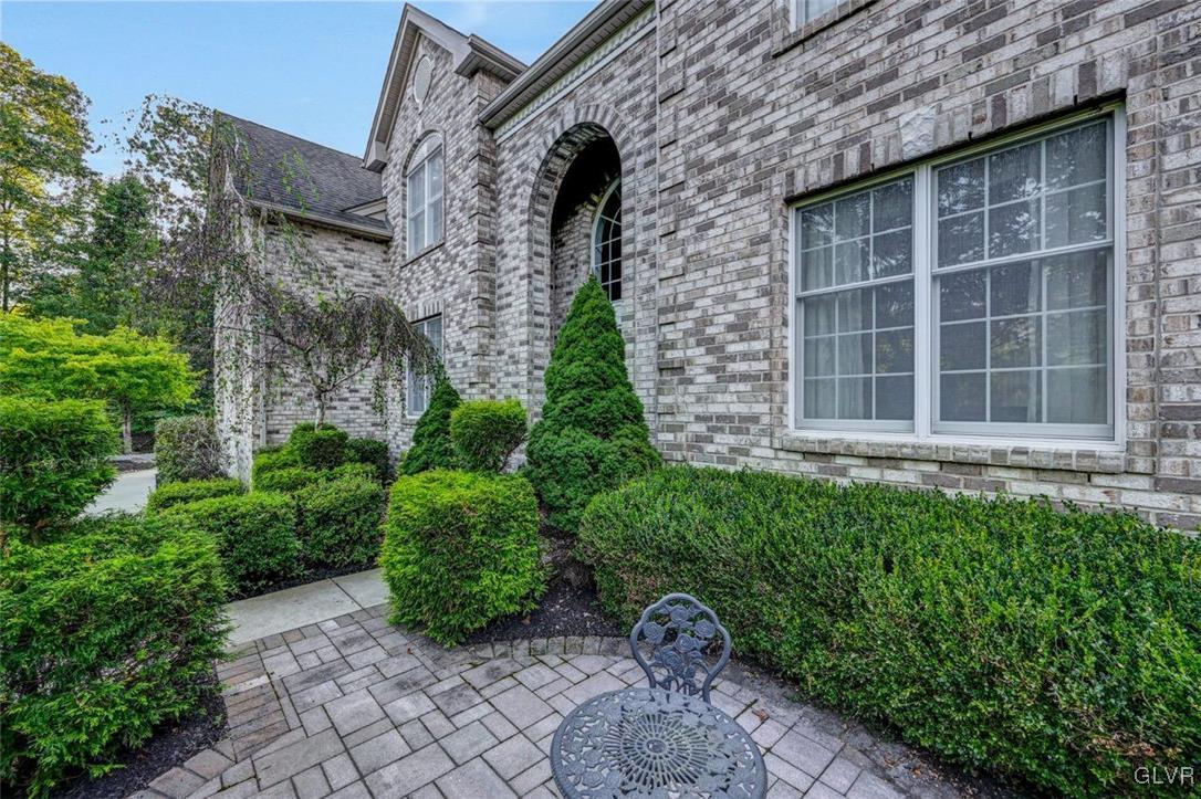 175 Jacoby Run Road Mount Bethel, PA 18343 - Photo 4 of 50 Couartyard view with paver walkway lined by mature
