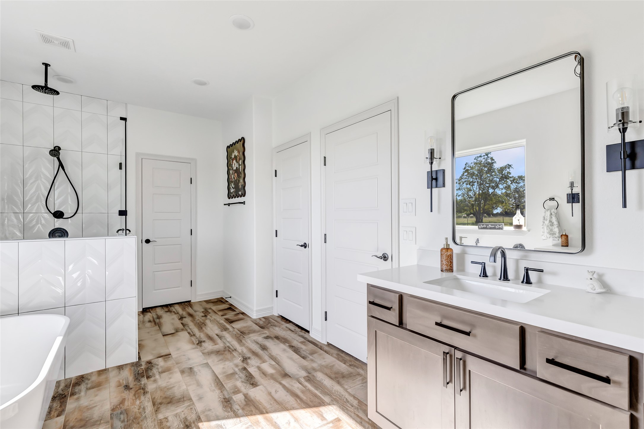 136 Timber Ridge Road Liberty, TX 77575 - Photo 24 of 50 a bathroom with a sink and a mirror