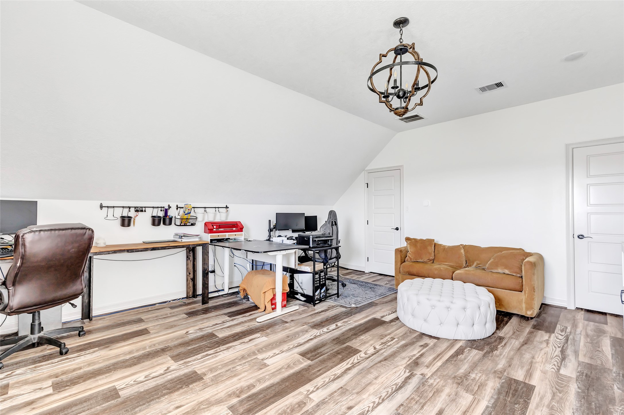 136 Timber Ridge Road Liberty, TX 77575 - Photo 28 of 50 a living room with furniture and a wooden floor