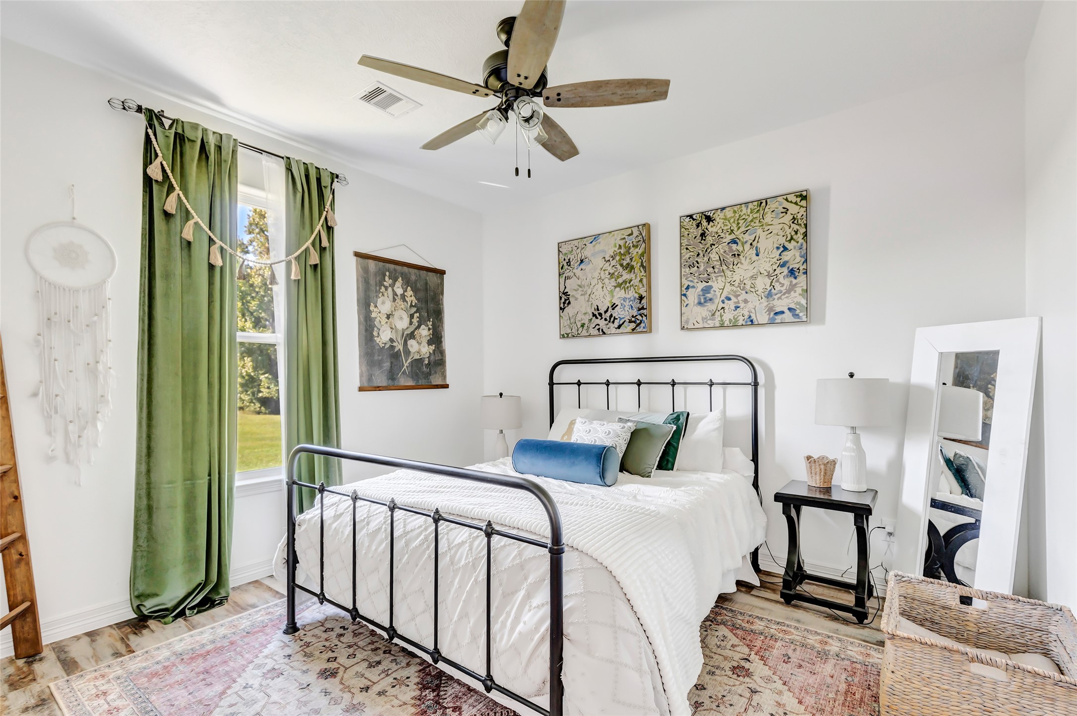 136 Timber Ridge Road Liberty, TX 77575 - Photo 31 of 50 a bedroom with furniture and a window