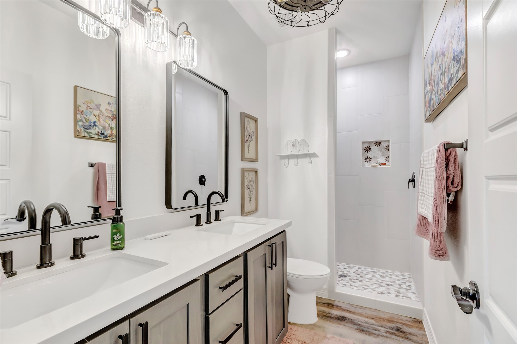 136 Timber Ridge Road Liberty, TX 77575 - Photo 32 of 50 a bathroom with a sink double vanity and a toilet