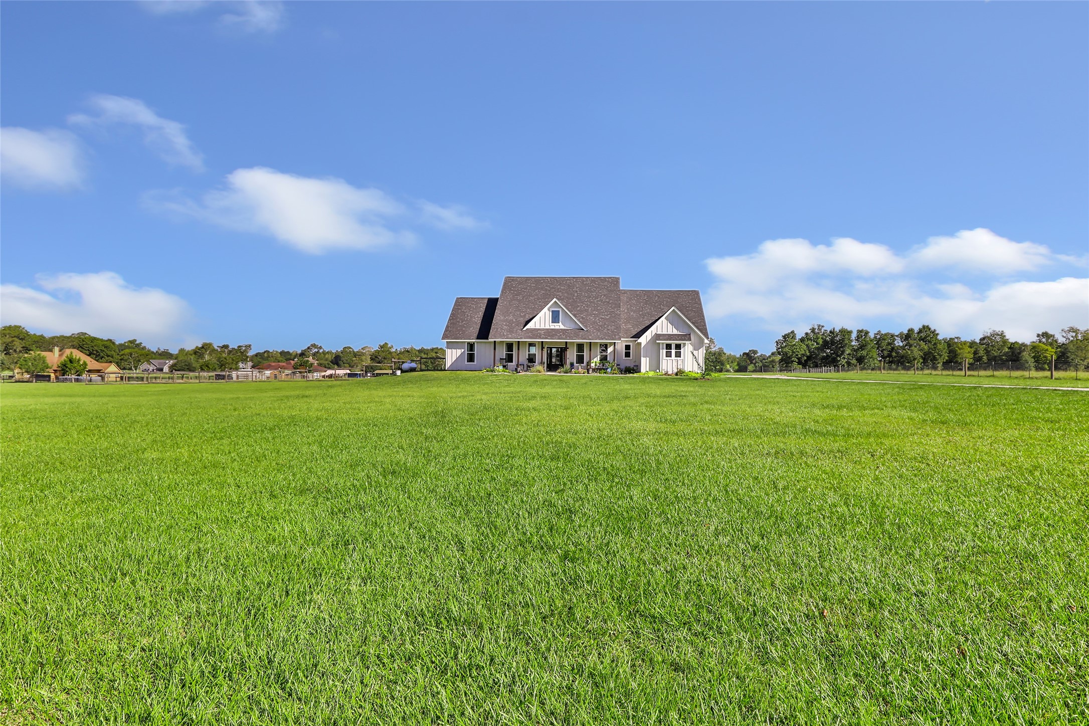 136 Timber Ridge Road Liberty, TX 77575 - Photo 41 of 50 a view of a house with a big yard and large trees