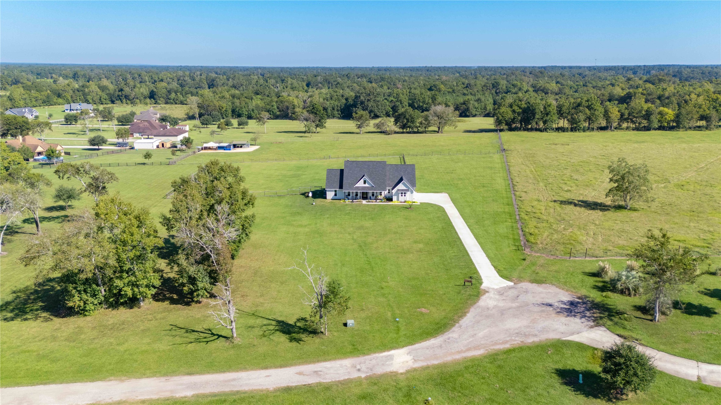 136 Timber Ridge Road Liberty, TX 77575 - Photo 43 of 50 a view of a lake with a city
