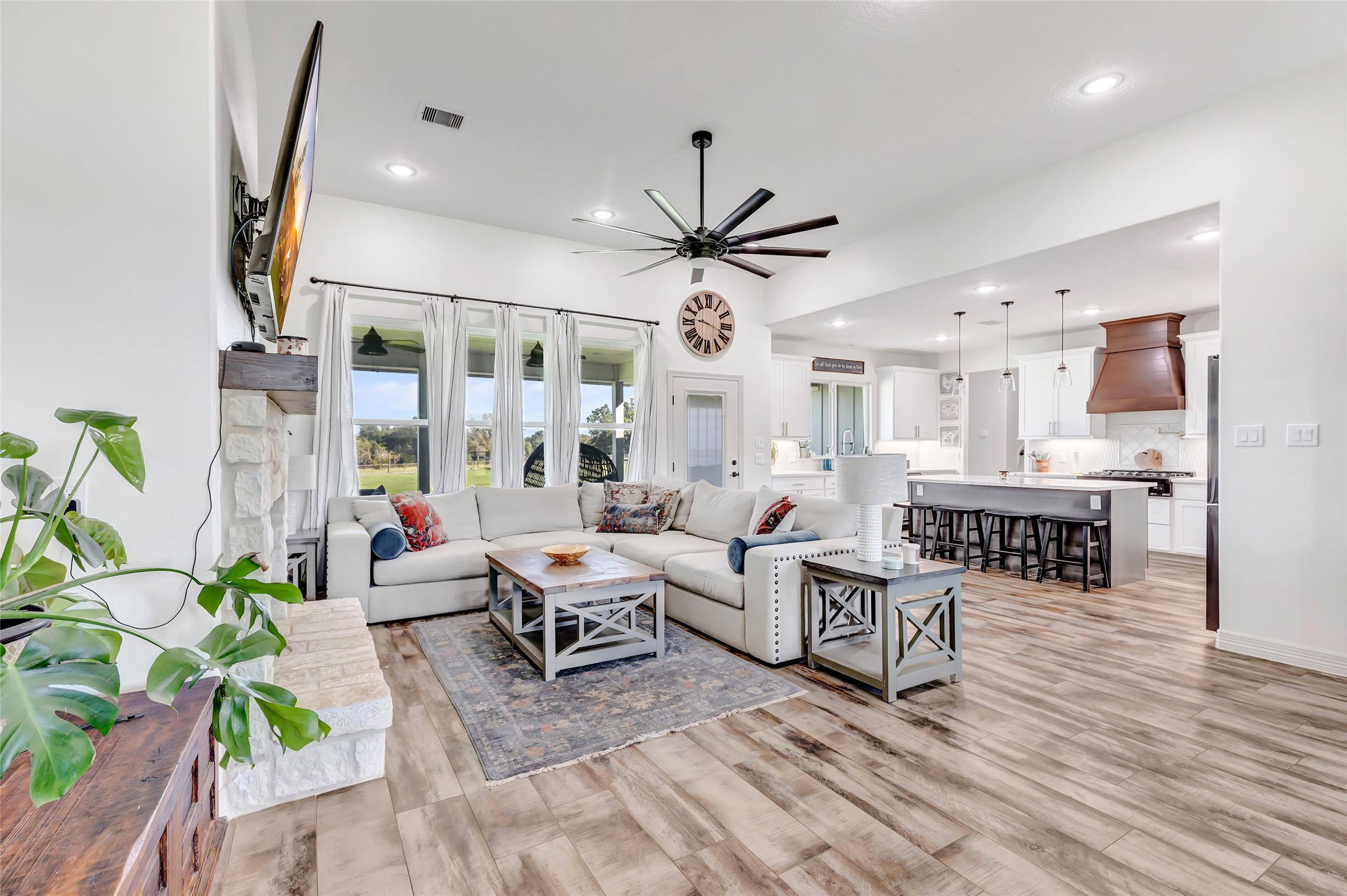 136 Timber Ridge Road Liberty, TX 77575 - Photo 9 of 50 a living room with lots of furniture and a chandelier