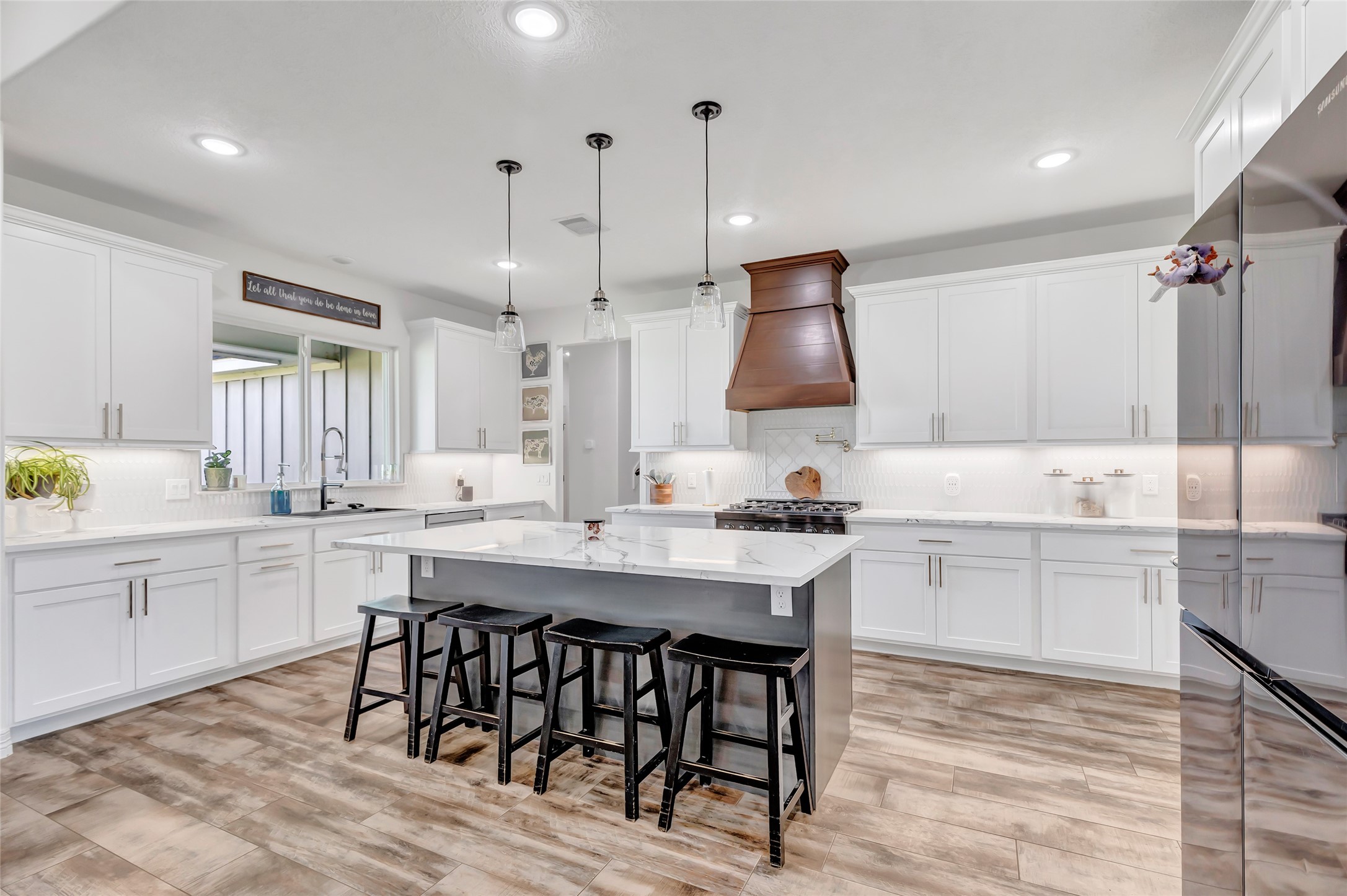 136 Timber Ridge Road Liberty, TX 77575 - Photo 10 of 50 a kitchen with a table and chairs in it