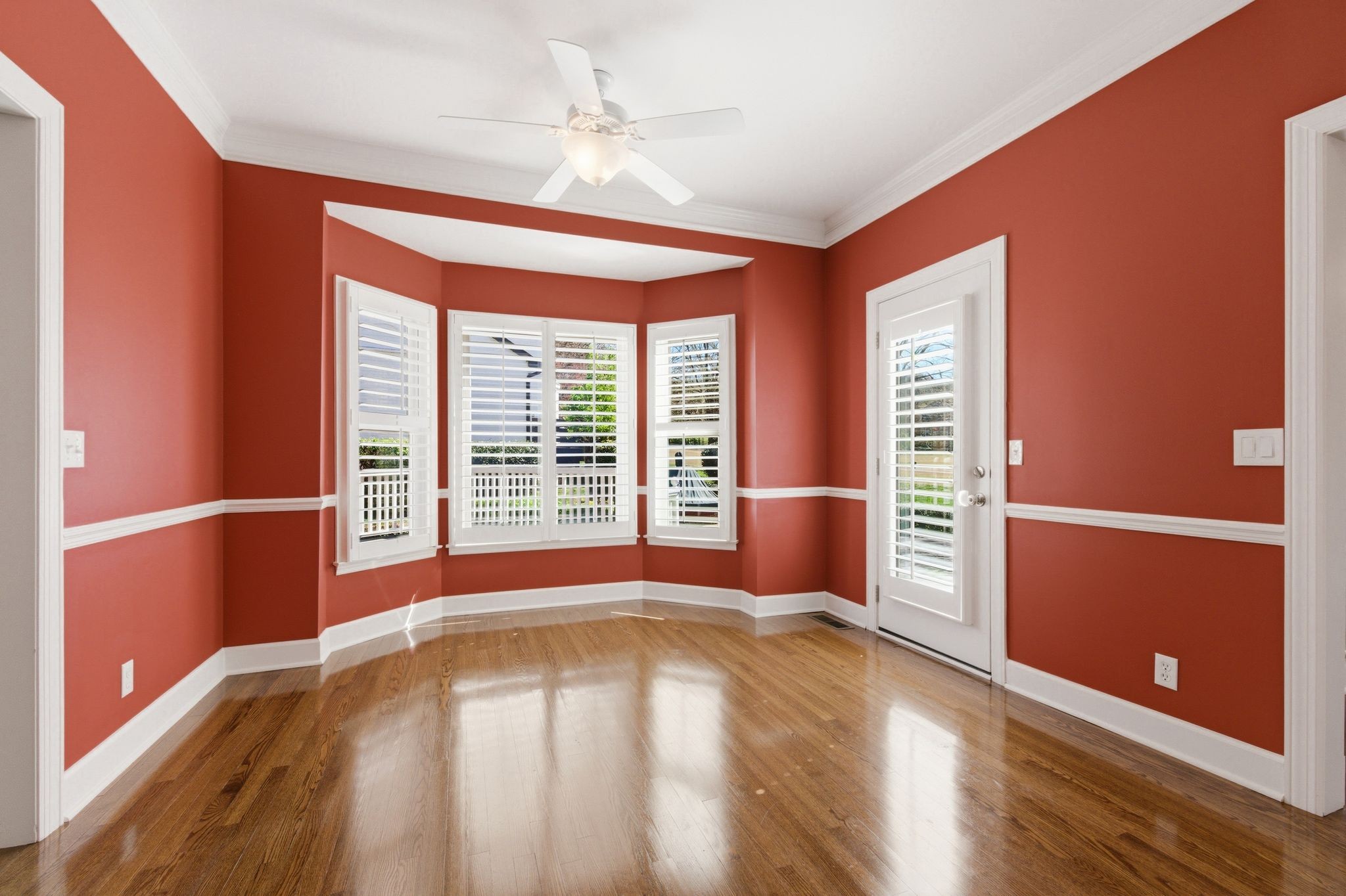 202 Bramley Place Franklin, TN 37069 - Photo 11 of 32 a view of an empty room with window and wooden floor
