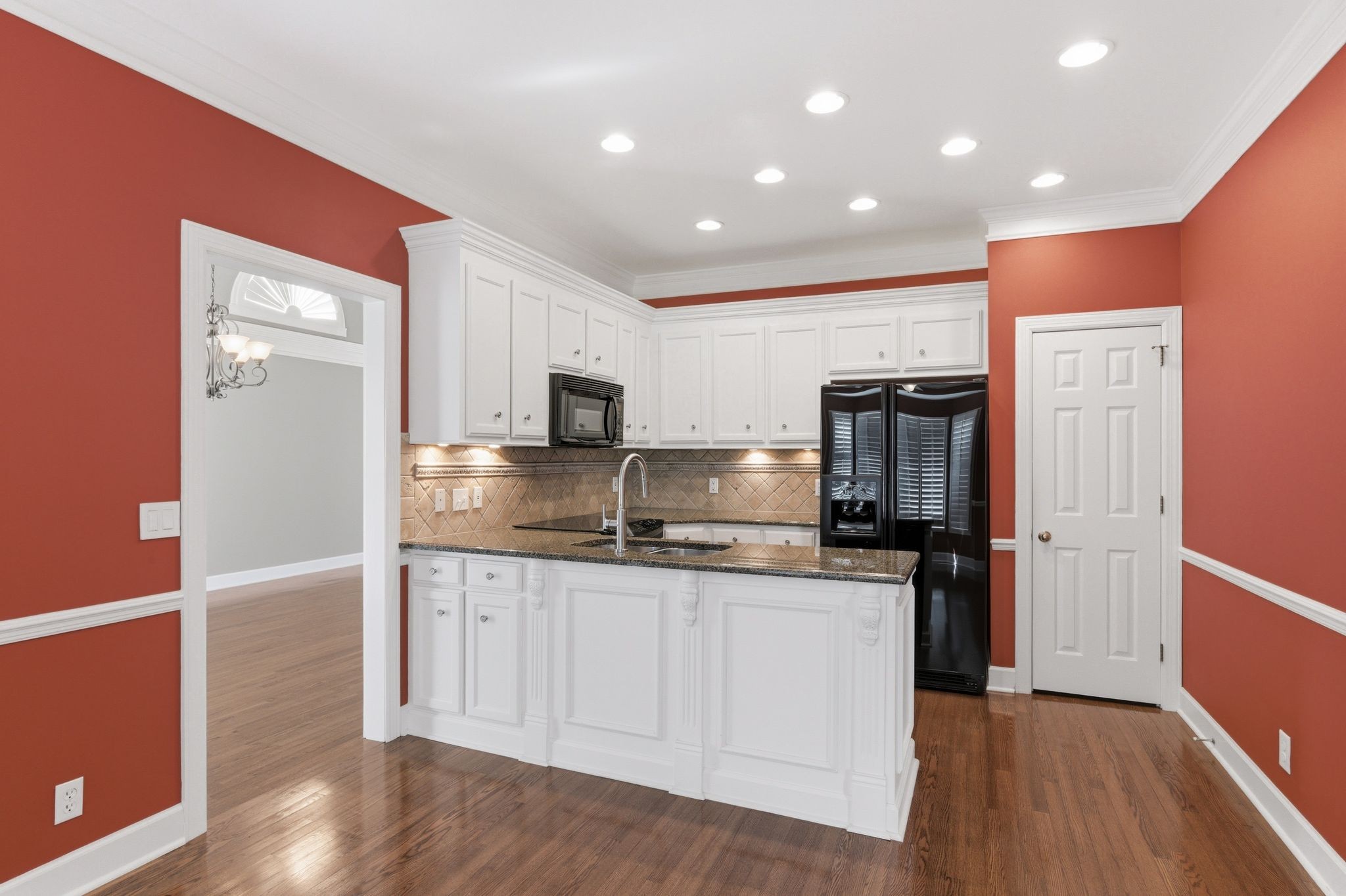 202 Bramley Place Franklin, TN 37069 - Photo 12 of 32 a kitchen with stainless steel appliances granite countertop a refrigerator and a stove top oven