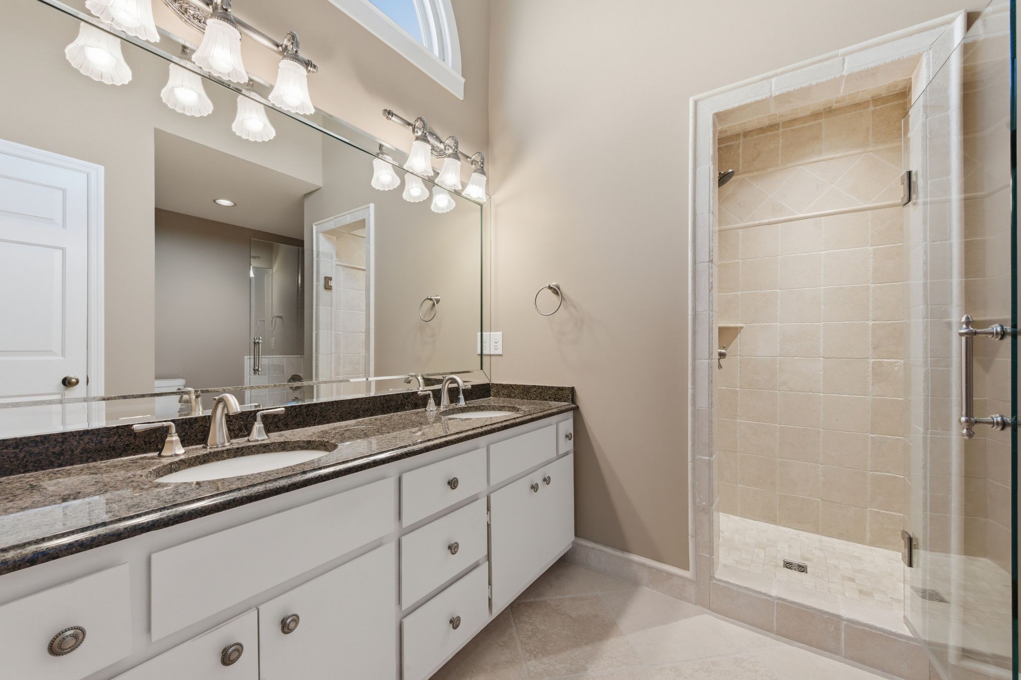202 Bramley Place Franklin, TN 37069 - Photo 21 of 32 a bathroom with a granite countertop double vanity sink mirror and shower
