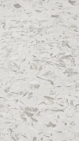 a brick wall with a white wall