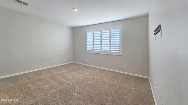 an empty room with a window