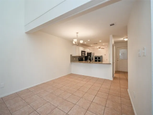 a living room with furniture fireplace and a flat screen tv