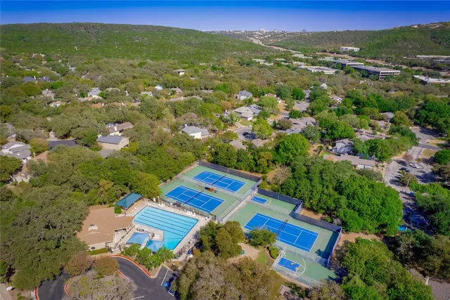 an aerial view of a house with a garden