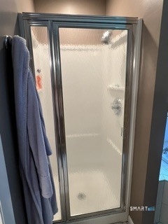 72 Pinnacle Road Ellington, CT 06029 - Photo 25 of 38 a bathroom with a glass shower door