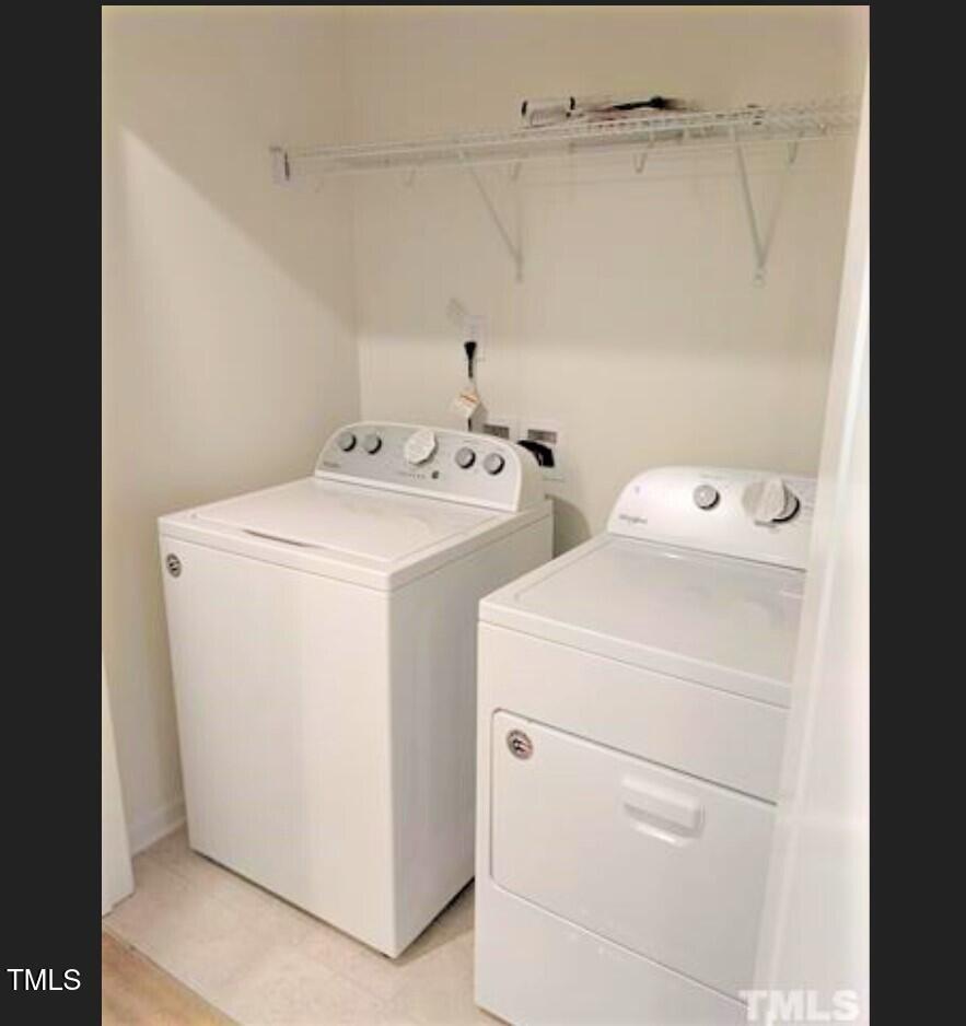 4121 Mahal Avenue Cary, NC 27519 - Photo 17 of 33 a utility room with dryer and washer