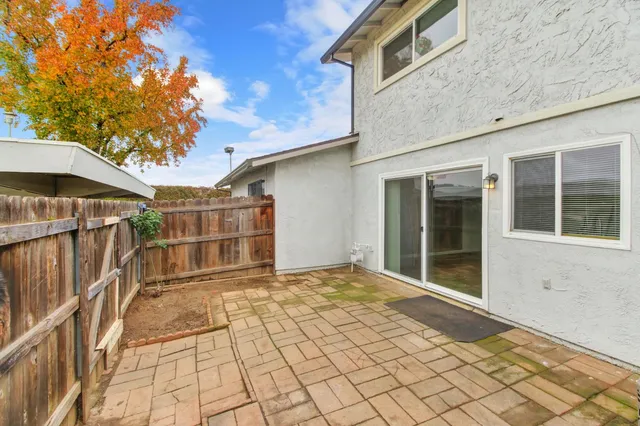 a view of a car parked in front of a house