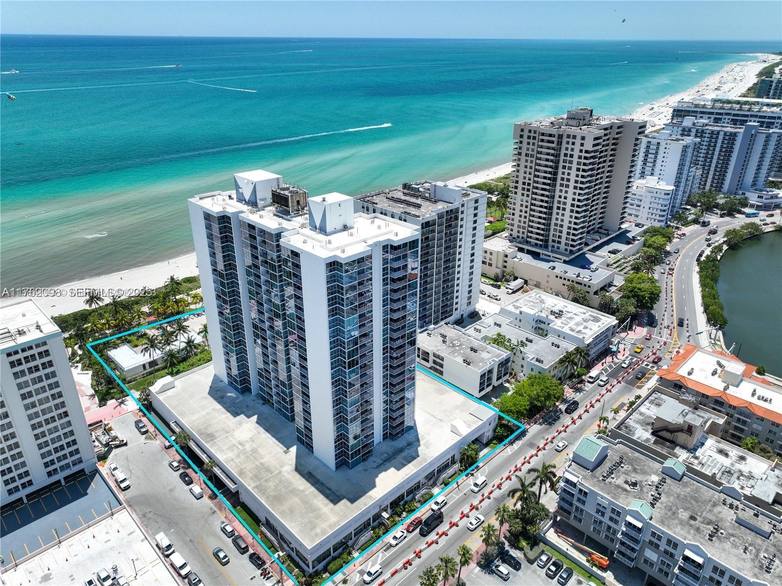 2655 Collins Avenue, Unit 1906 Miami Beach, FL 33140 - Photo 1 of 35 a view of a balcony with an outdoor space