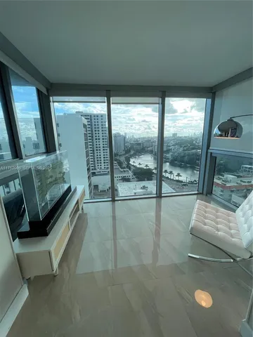 a view of a garden with a building in the background