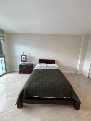 a view of a city with tall buildings