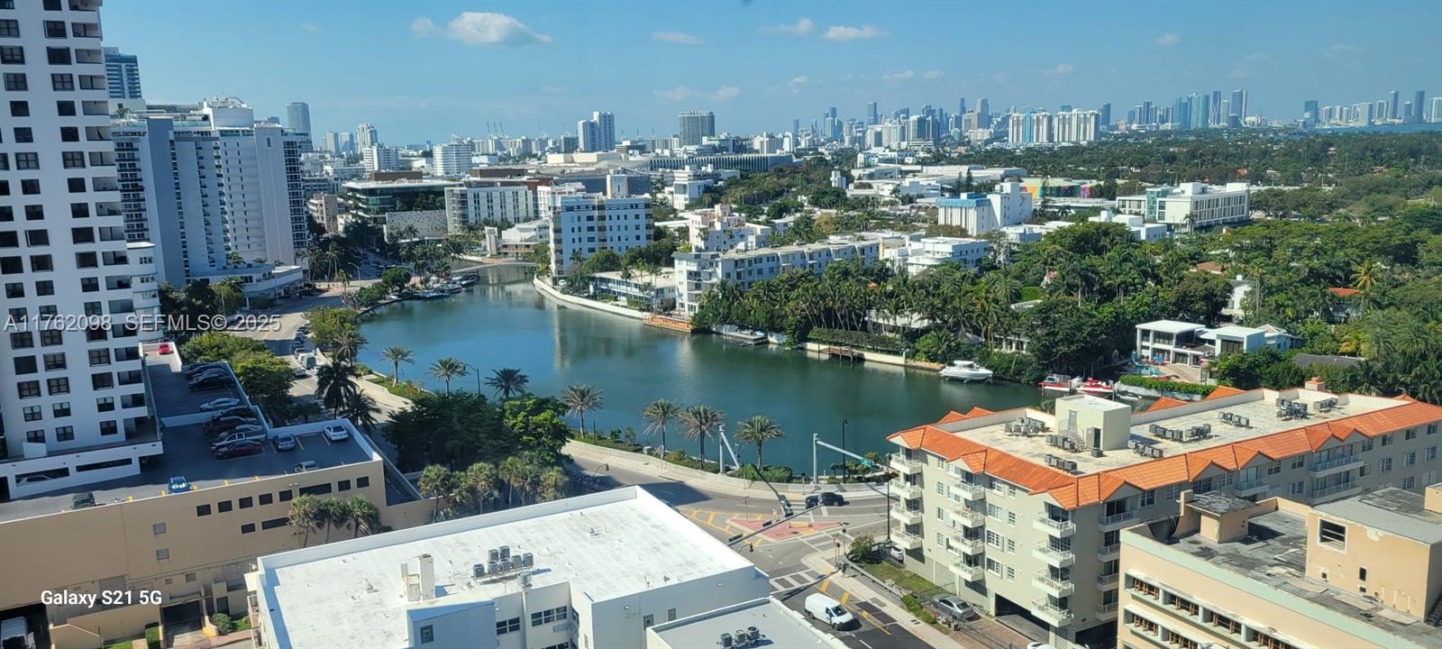 2655 Collins Avenue, Unit 1906 Miami Beach, FL 33140 - Photo 20 of 35 a view of a city with tall buildings
