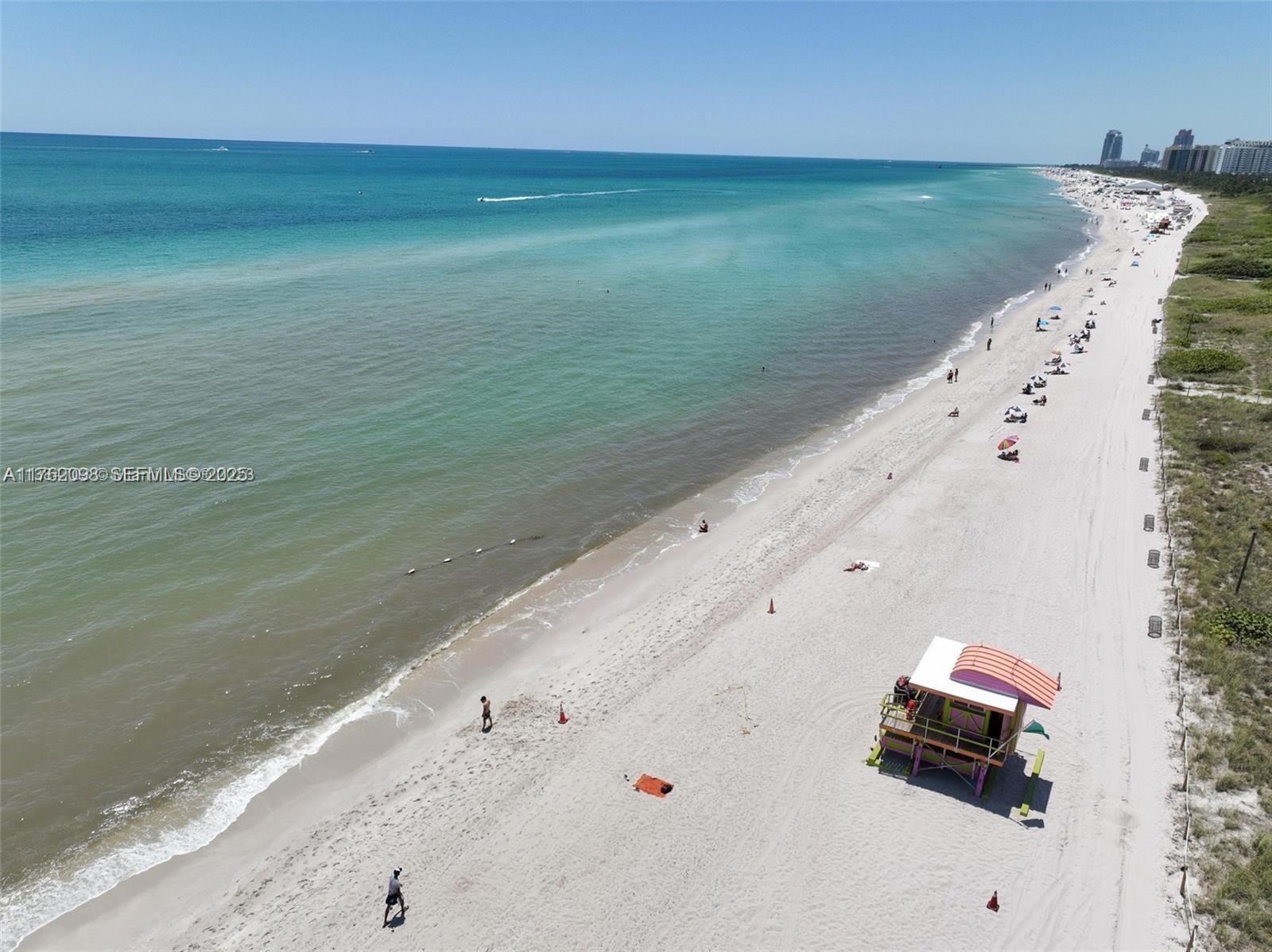 2655 Collins Avenue, Unit 1906 Miami Beach, FL 33140 - Photo 24 of 35 View of out long Beach great to swim or walk along. We also have in front of our Mirasol condo a Beach Safe Guard, always ready to help . Also posted Color Flags that inform the warnings beach related.