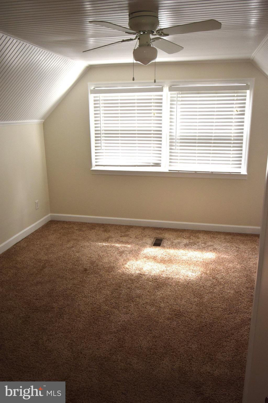 1354 Sudvale Road Pikesville, MD 21208 - Photo 11 of 17 a view of empty room with window