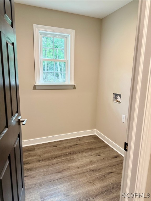 26 Tupelo Street Deltaville, VA 23043 - Photo 15 of 38 a view of a room with wooden floor and window