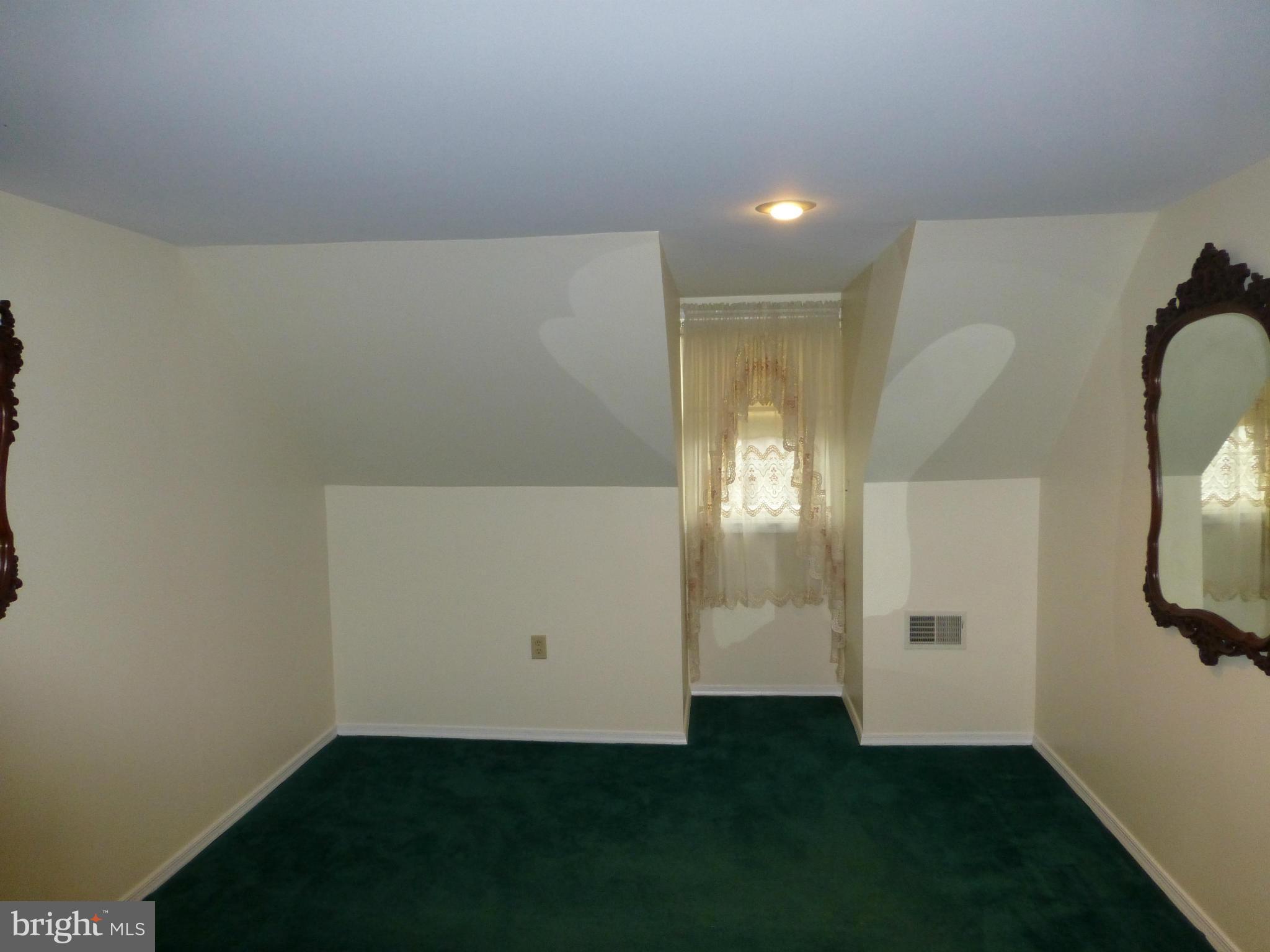 9317 Perglen Road Baltimore, MD 21236 - Photo 12 of 23 an empty room with windows