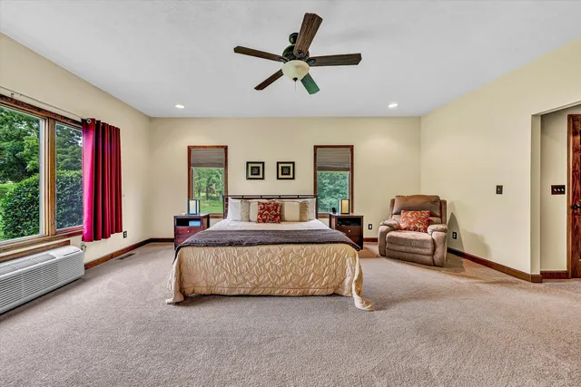 a bed room with bed and window