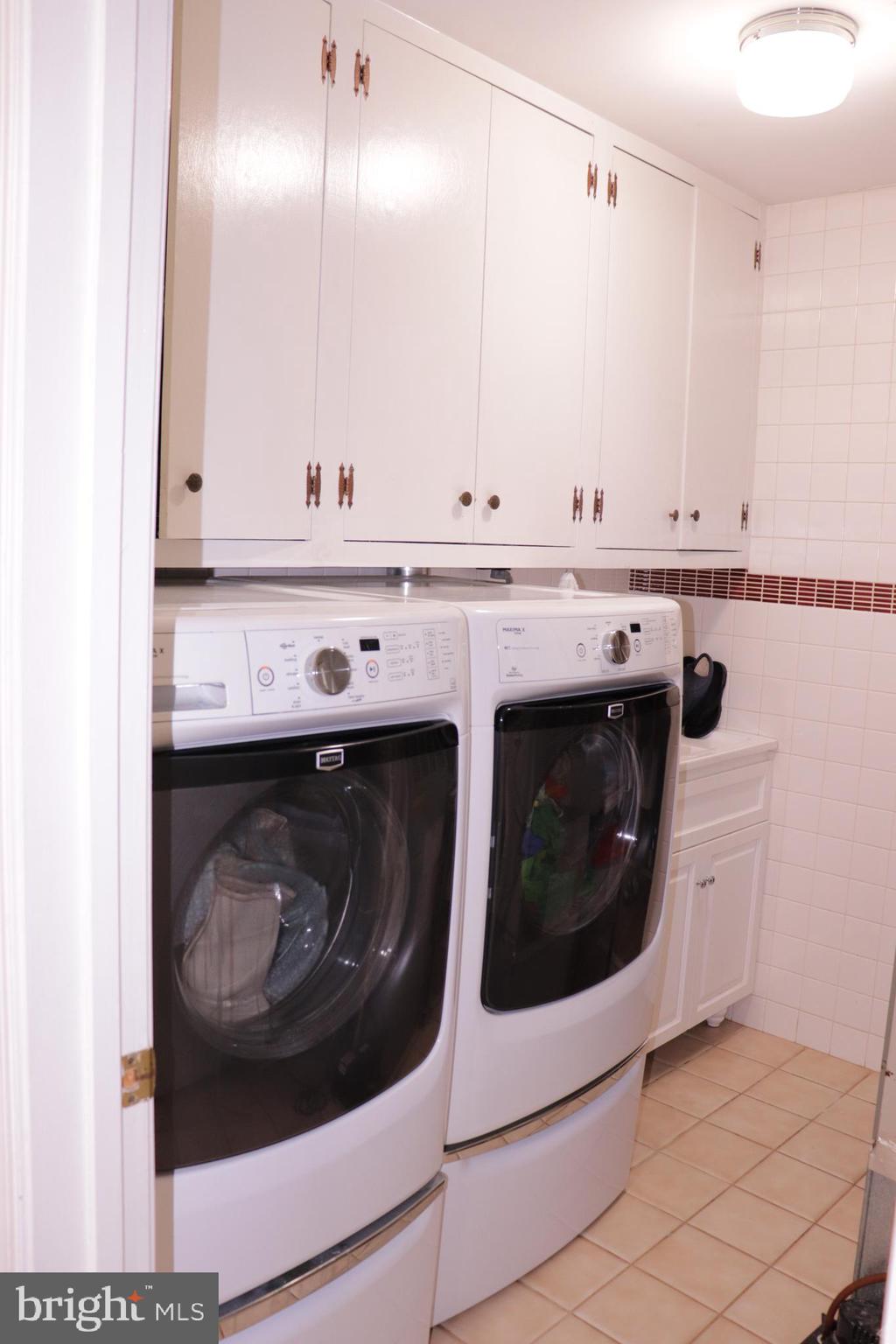 103 East Poplar Road Sterling, VA 20164 - Photo 8 of 24 Laundry room