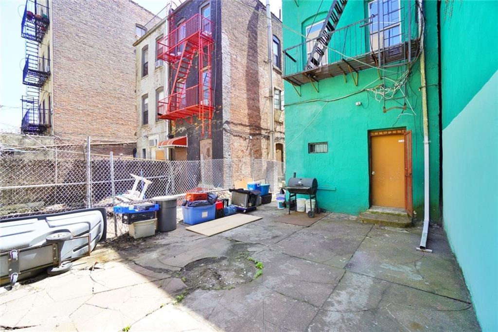 533 Sutter Avenue Brooklyn, NY 11207 - Photo 18 of 18 a view of a brick building with many windows