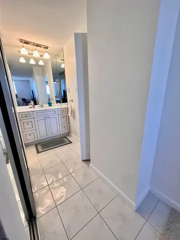 a view of living room with a mirror