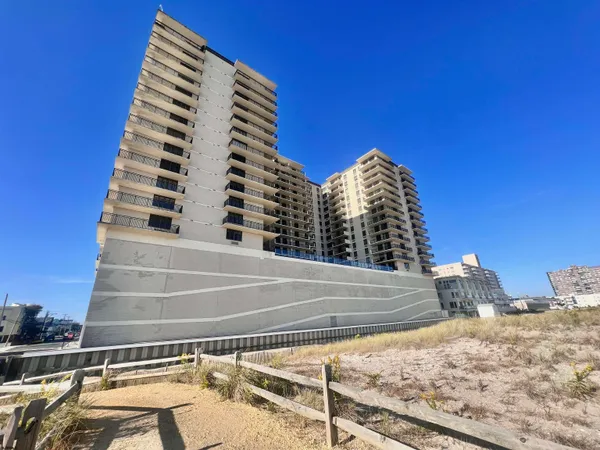 a view of roof with city view