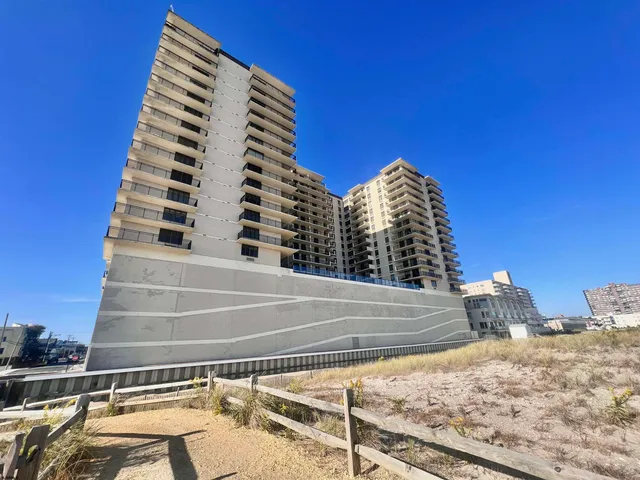 a view of roof with city view