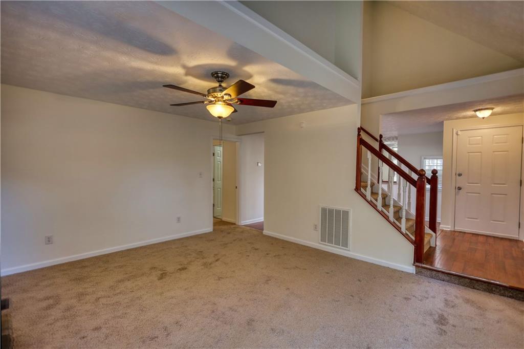 2475 Nugget Drive Southwest Conyers, GA 30094 - Photo 13 of 47 a view of an empty room with a window