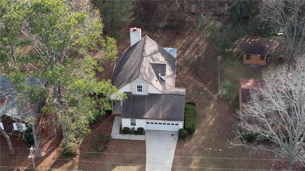 2475 Nugget Drive Southwest Conyers, GA 30094 - Photo 6 of 47 a aerial view of a house with a yard and fountain
