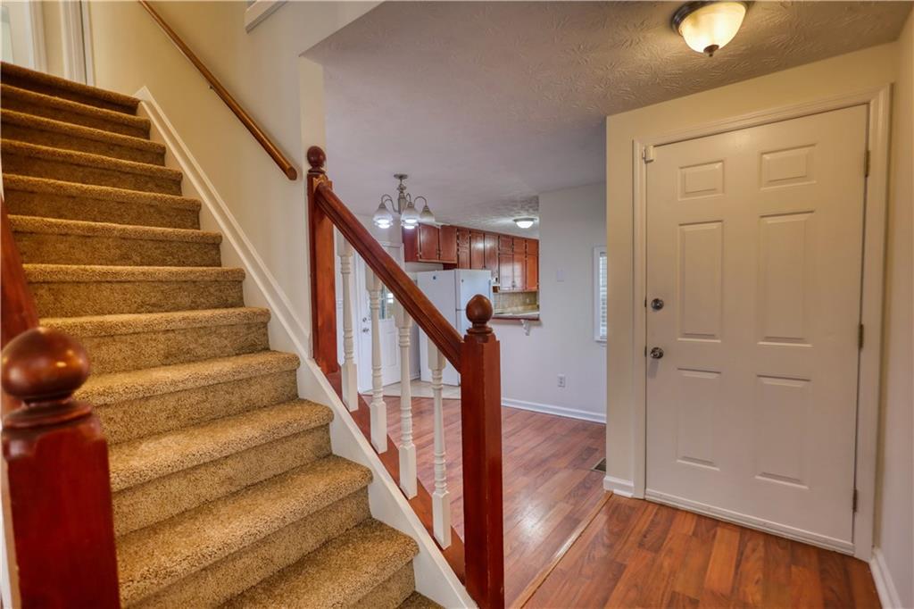 2475 Nugget Drive Southwest Conyers, GA 30094 - Photo 8 of 47 a view of entryway and hall with wooden floor