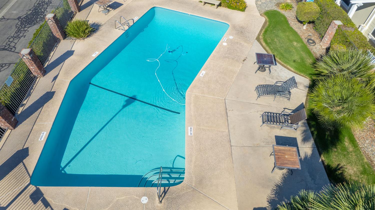 1300 West Olson Avenue, Unit 75 Reedley, CA 93654 - Photo 37 of 40 an aerial view of a house with a yard