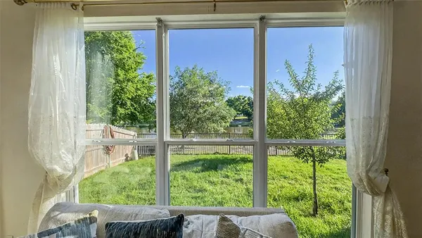 a view of a back yard from a window